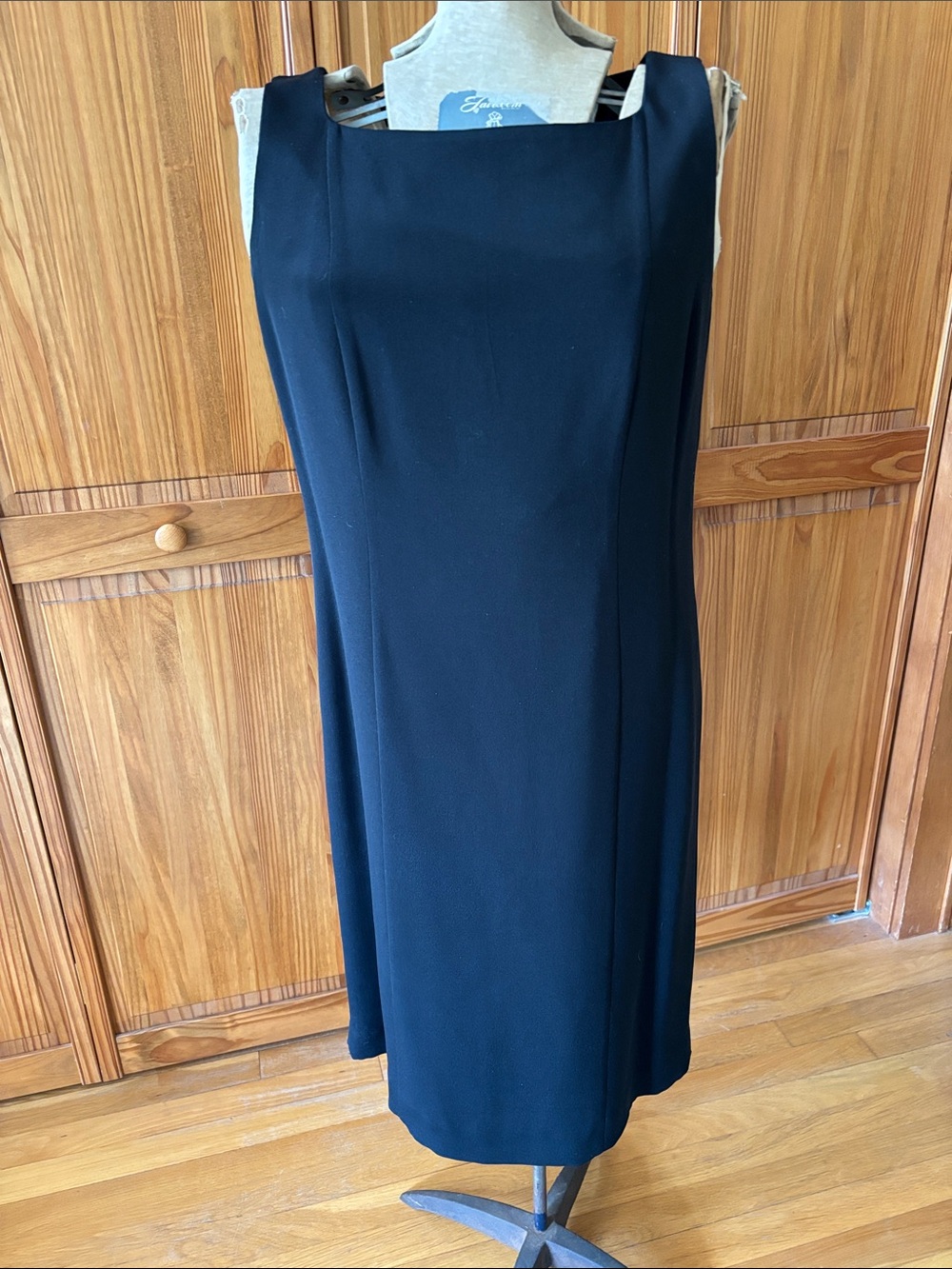Sleeveless black silk dress